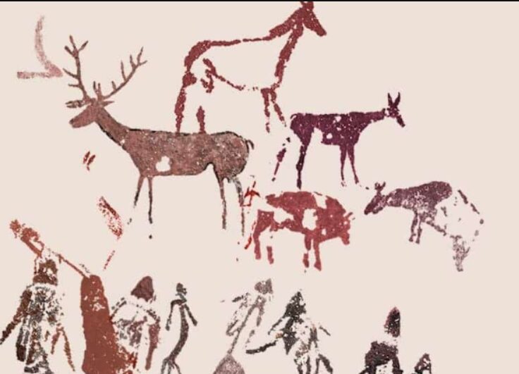 Détail des peintures rupestres avec trois bovidés peints dans les tons rouges et noirs.